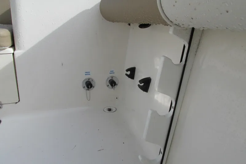 Slide: The Image of 2023 Sea Born LX22 Center Console interior detail with utility features. - 17