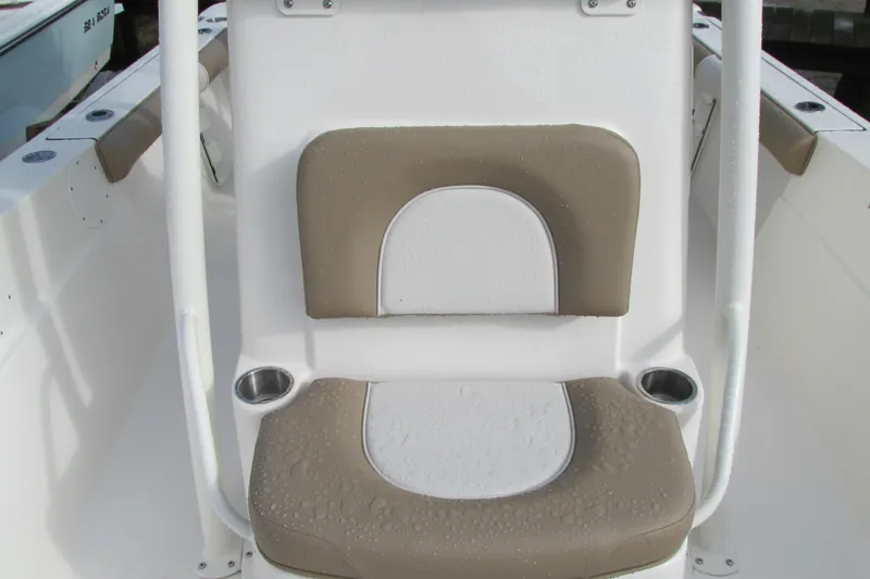 Slide: The Image of 2023 Sea Born LX22 Center Console boat seat with cup holders. - 25
