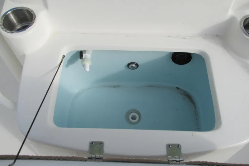 Slide: The Image of Livewell compartment on 2023 Sea Born LX22 Center Console boat. - 27