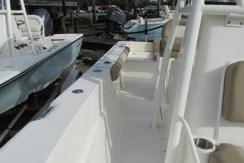 Slide: The Image of 2023 Sea Born LX22 Center Console boat interior with seating and storage. - 28
