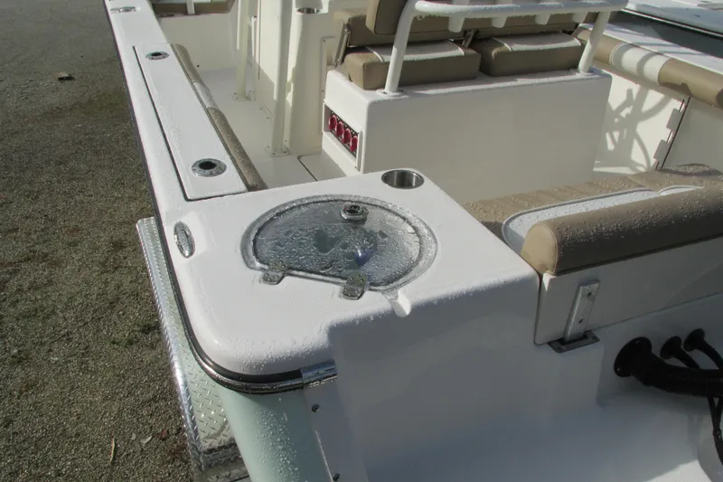 Slide: The Image of 2023 Sea Born LX22 Center Console boat interior with seating and storage features. - 8