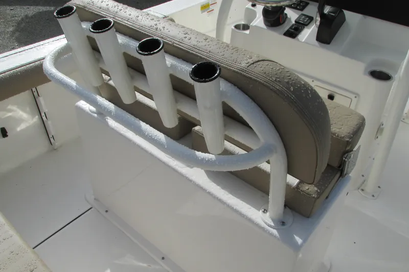 Slide: The Image of 2023 Sea Born LX22 Center Console boat seating with rod holders. - 9