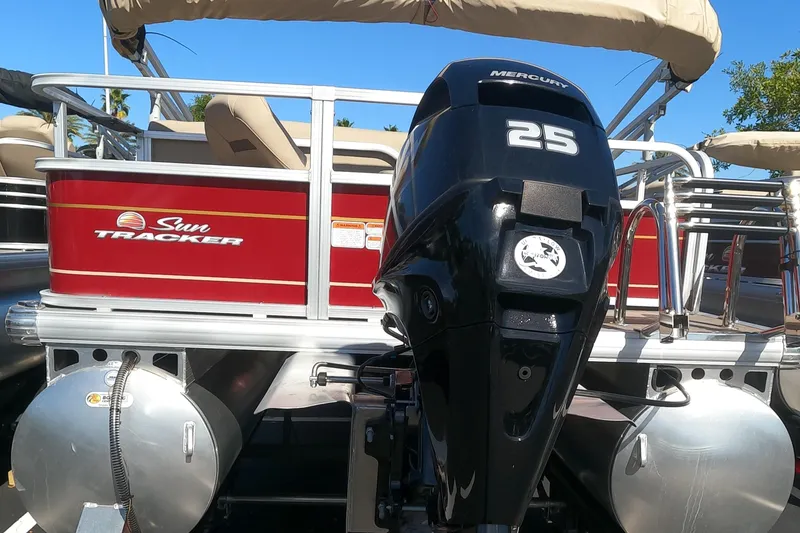 Slide: The Image of 2023 Sun Tracker Bass Buggy 18 DLX pontoon boat with Mercury 25 outboard motor. - 11