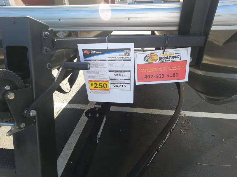 Slide: The Image of 2023 Sun Tracker Bass Buggy 18 DLX price tag and contact information. - 8