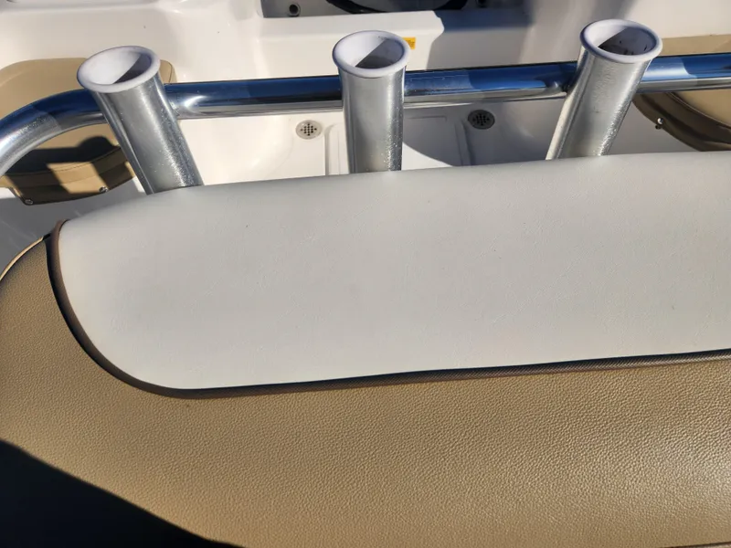 Slide: The Image of Key West 176 Center Console 2018 boat seat with rod holders. - 8