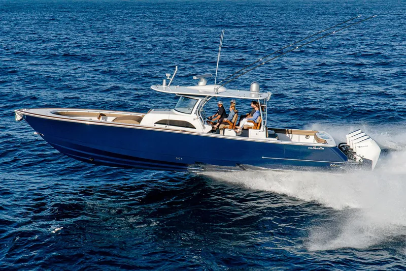 The Image of 2025 Valhalla Boatworks V-46 cruising on open water, showcasing sleek design and powerful performance. - 1