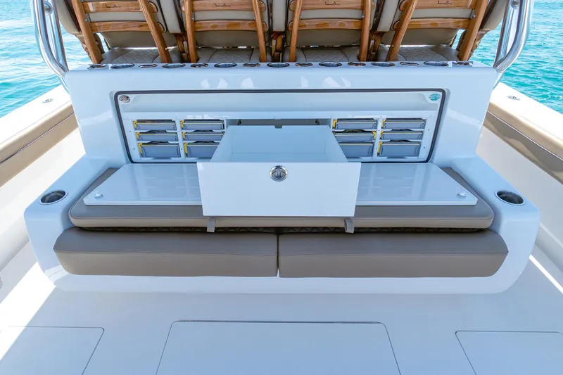 Slide: The Image of 2025 Valhalla Boatworks V-46 interior with storage compartments and seating. - 13