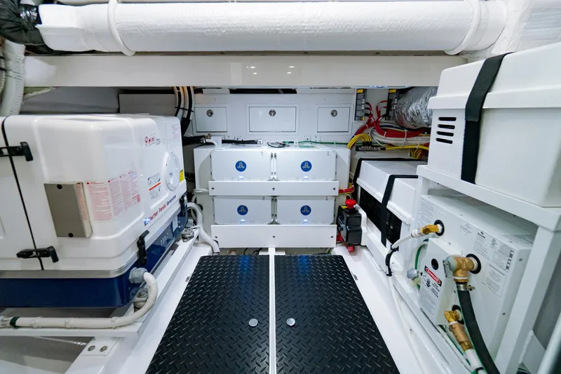 Slide: The Image of Engine room of 2025 Valhalla Boatworks V-46, featuring advanced equipment and systems. - 28