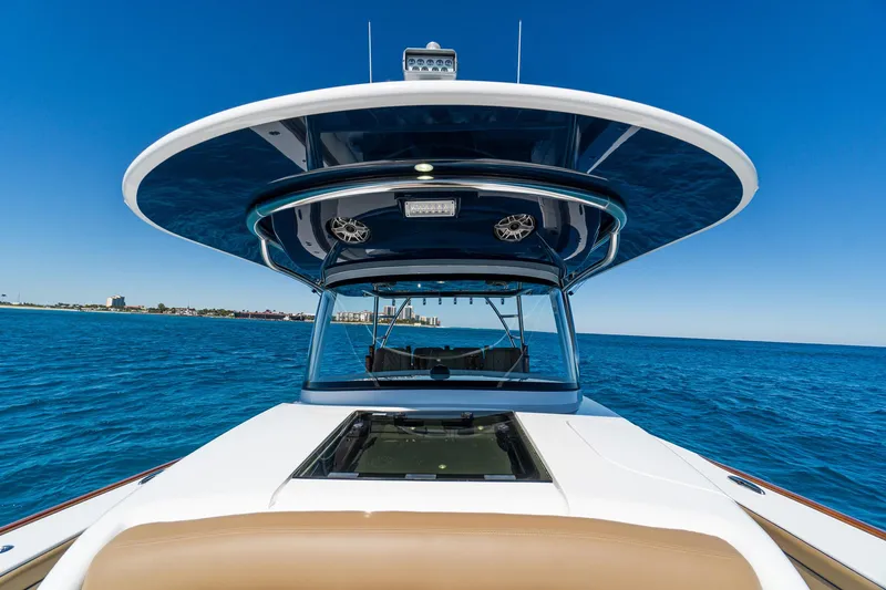 Slide: The Image of 2025 Valhalla Boatworks V-46 on open water, showcasing sleek design and modern features. - 29