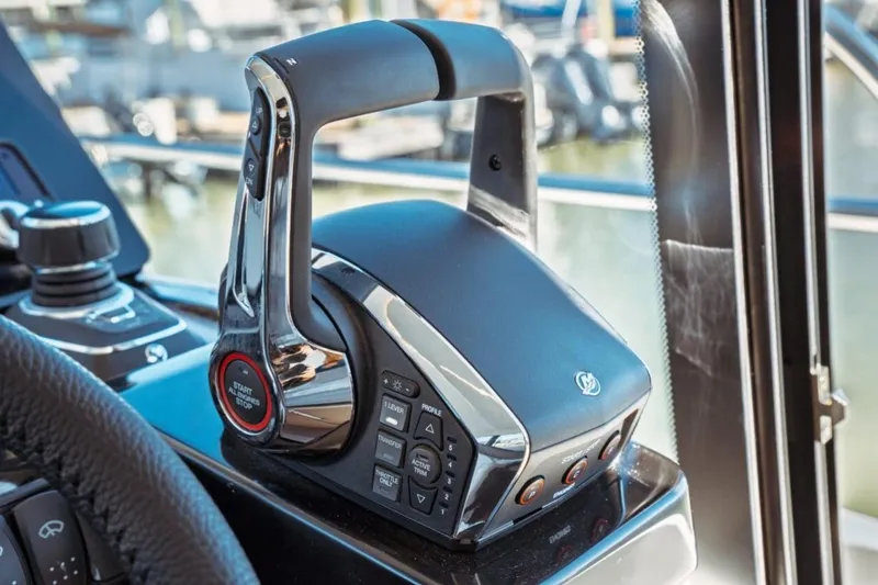 Slide: The Image of Control panel of 2026 Jeanneau NC 1295 Fly yacht, featuring advanced navigation controls. - 30