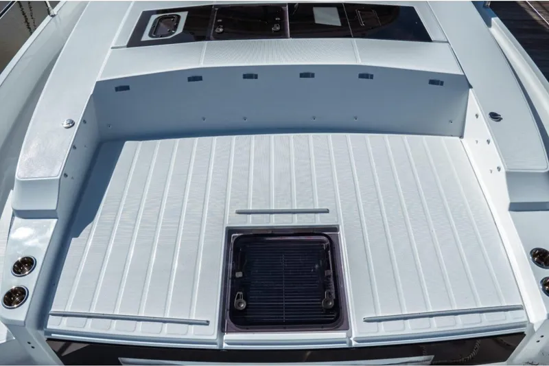 Slide: The Image of 2026 Jeanneau NC 1295 Fly boat deck, featuring sleek design and modern amenities. - 34