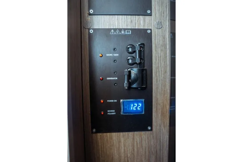 Slide: The Image of Control panel on 2026 Jeanneau NC 1295 Fly yacht with digital display and switches. - 81