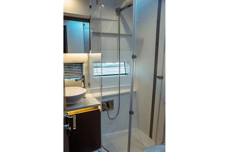 Slide: The Image of Modern bathroom interior of 2026 Jeanneau NC 1295 Fly yacht with shower and sink. - 82