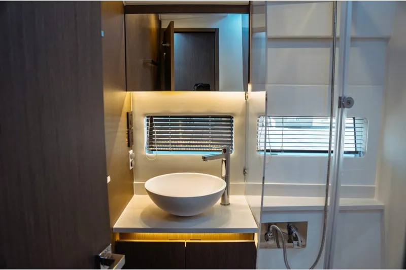 Slide: The Image of Luxurious bathroom interior of 2026 Jeanneau NC 1295 Fly yacht with modern sink and lighting. - 85