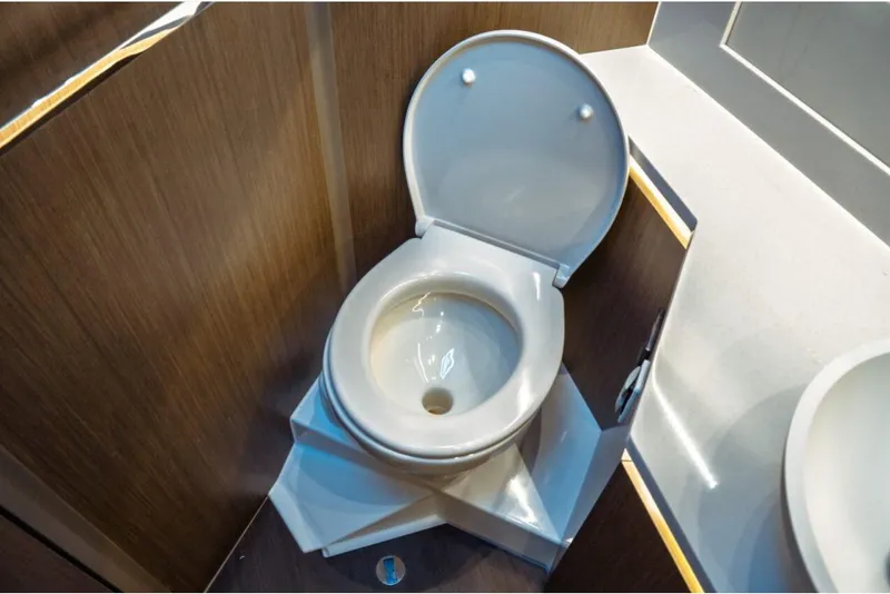 Slide: The Image of Modern bathroom on 2026 Jeanneau NC 1295 Fly yacht with sleek toilet design. - 87