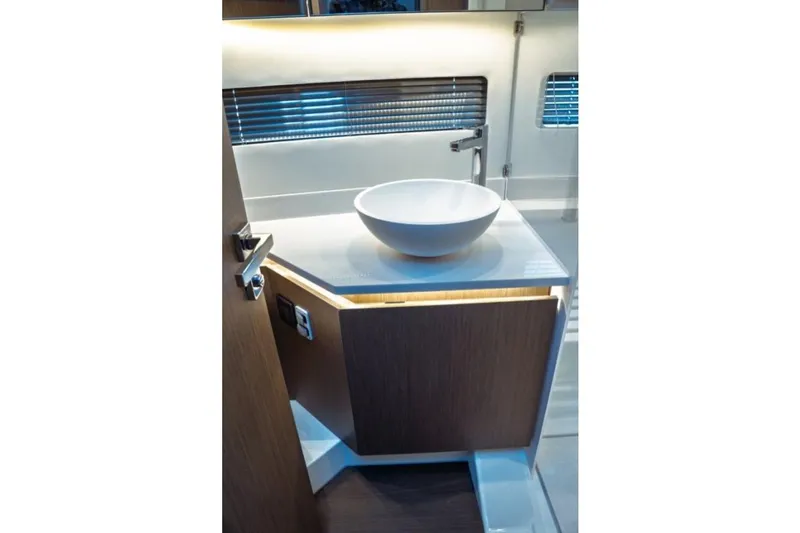 Slide: The Image of Modern bathroom interior of 2026 Jeanneau NC 1295 Fly yacht with sleek sink design. - 88