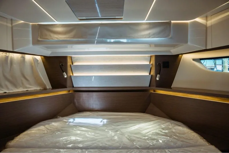 Slide: The Image of Luxurious interior cabin of the 2026 Jeanneau NC 1295 Fly yacht, featuring modern design elements. - 91