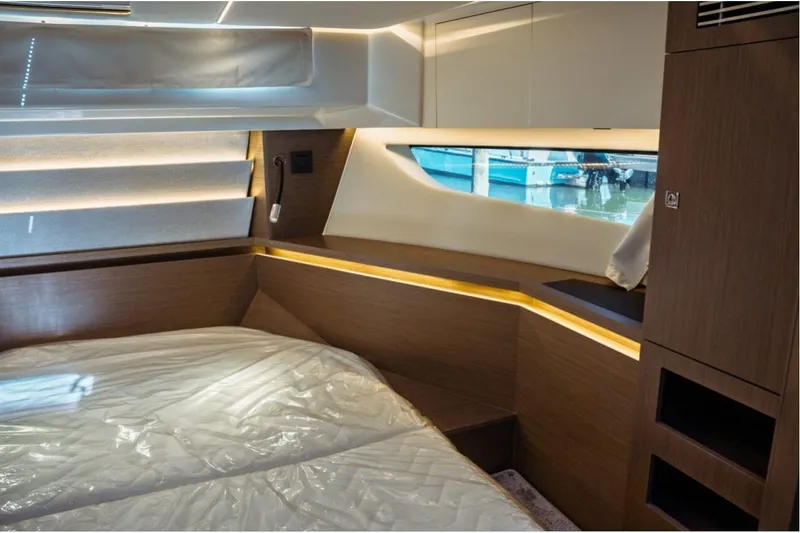 Slide: The Image of Luxurious interior cabin of 2026 Jeanneau NC 1295 Fly yacht with modern design. - 92