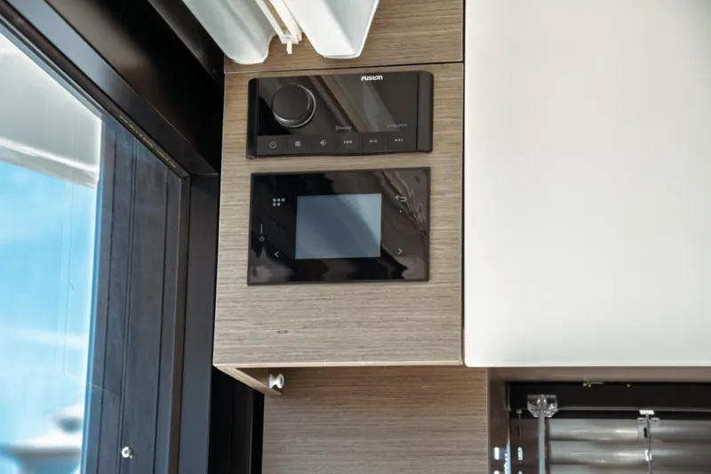 Slide: The Image of Control panel on Jeanneau NC 1295 Fly 2026 yacht interior. - 98