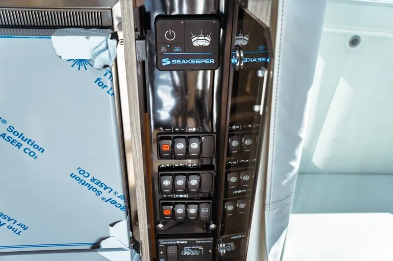 Slide: The Image of Control panel on 2026 Jeanneau NC 1295 Fly yacht featuring Seakeeper system. - 99