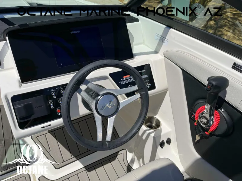 Slide: The Image of 2023 Sea Ray SPX 190 boat dashboard with steering wheel and controls, Octane Marine, Phoenix AZ. - 45