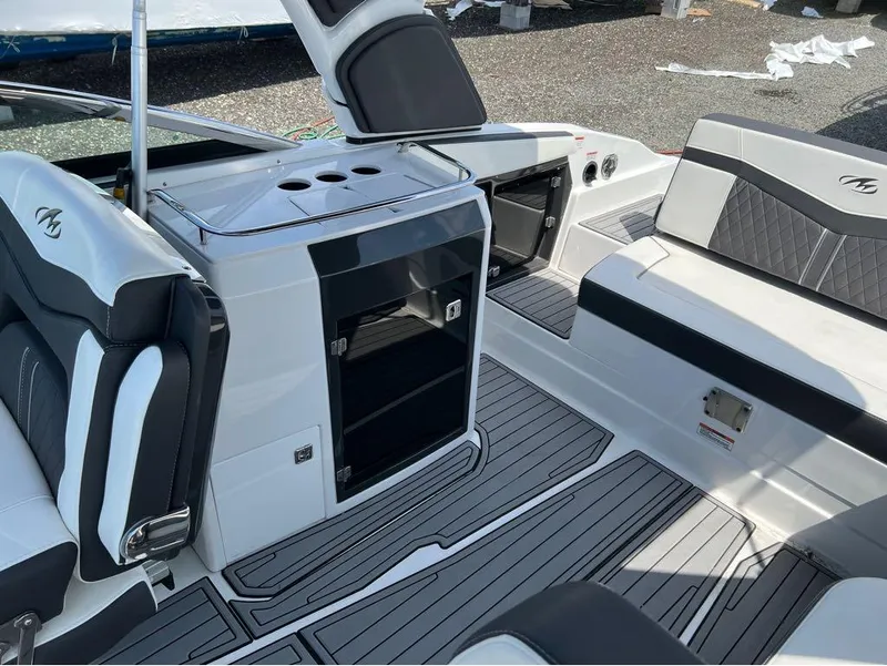Slide: The Image of Interior of 2020 Monterey 275 Super Sport boat with sleek seating and modern design. - 15