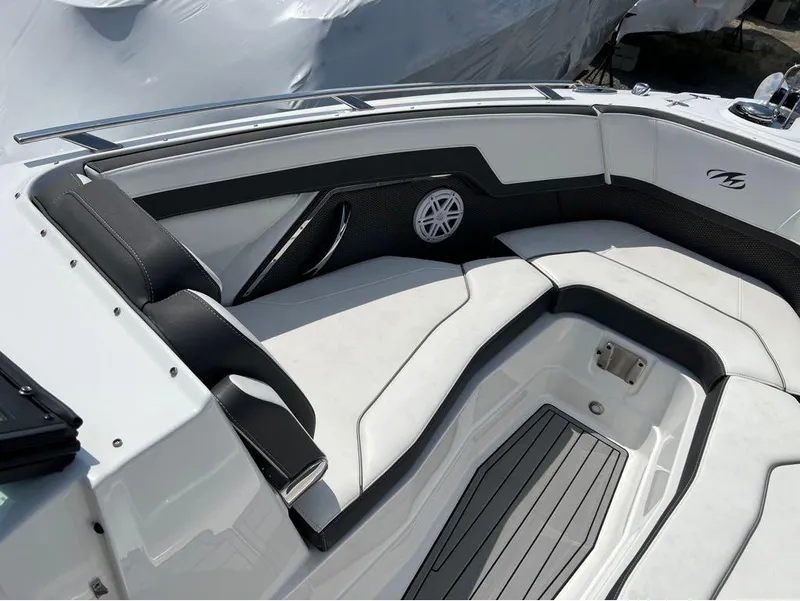 Slide: The Image of 2020 Monterey 275 Super Sport boat interior with sleek seating and modern design. - 17