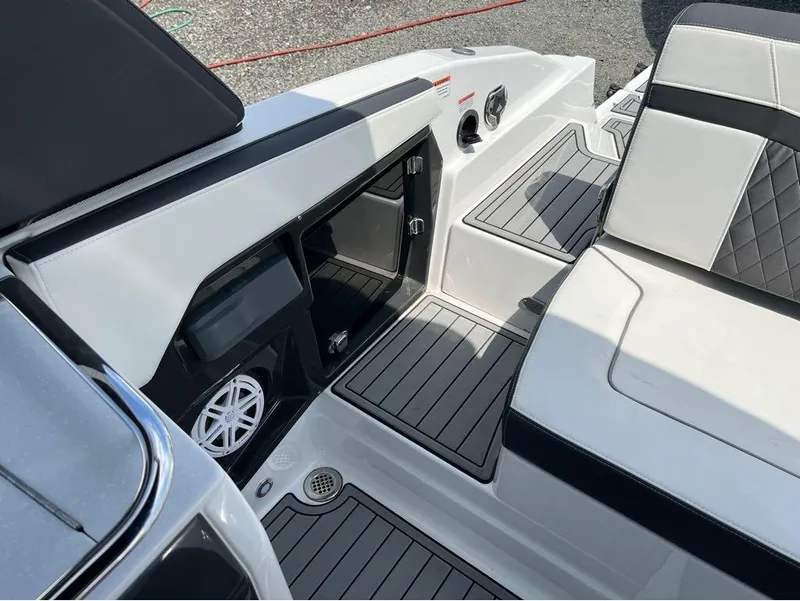 Slide: The Image of Interior of 2020 Monterey 275 Super Sport boat with sleek seating and speaker system. - 21