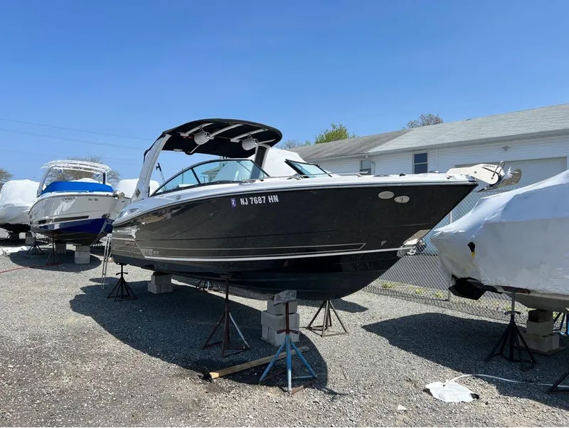 Slide: The Image of 2020 Monterey 275 Super Sport boat on stands, outdoor storage area. - 4