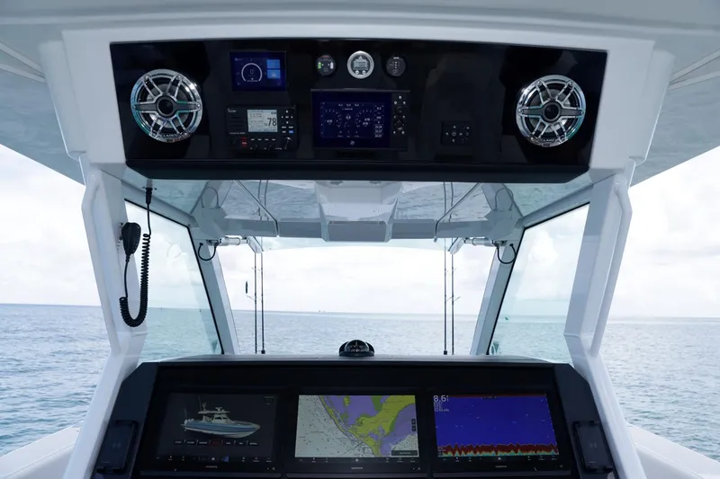 Slide: The Image of 2023 Formula 387 Center Console Fish dashboard with advanced navigation and control systems. - 18