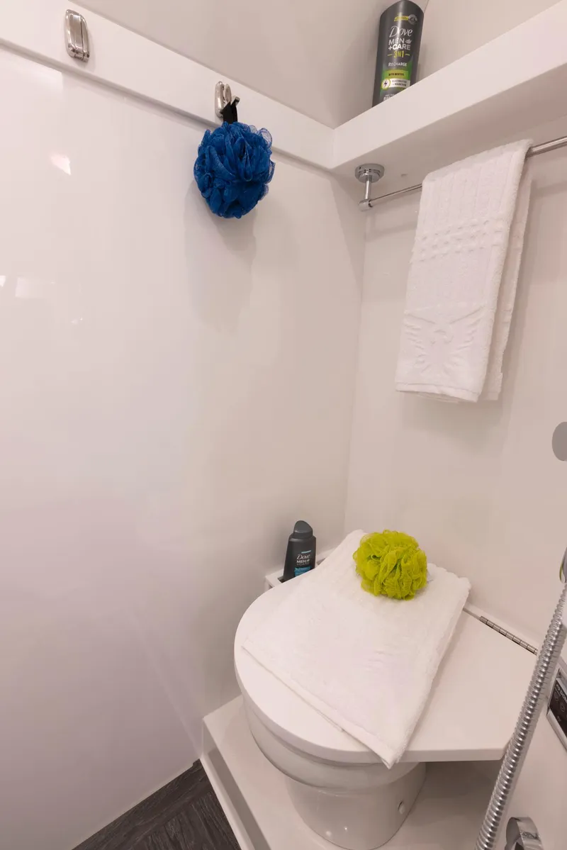 Slide: The Image of 2023 Formula 387 Center Console Fish boat bathroom with modern amenities. - 32