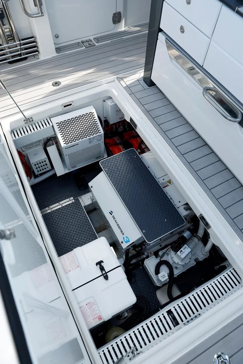 Slide: The Image of 2023 Formula 387 Center Console Sport engine compartment with modern equipment. - 14