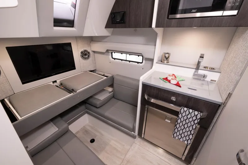 Slide: The Image of 2023 Formula 387 Center Console Sport cabin with modern amenities and sleek design. - 17