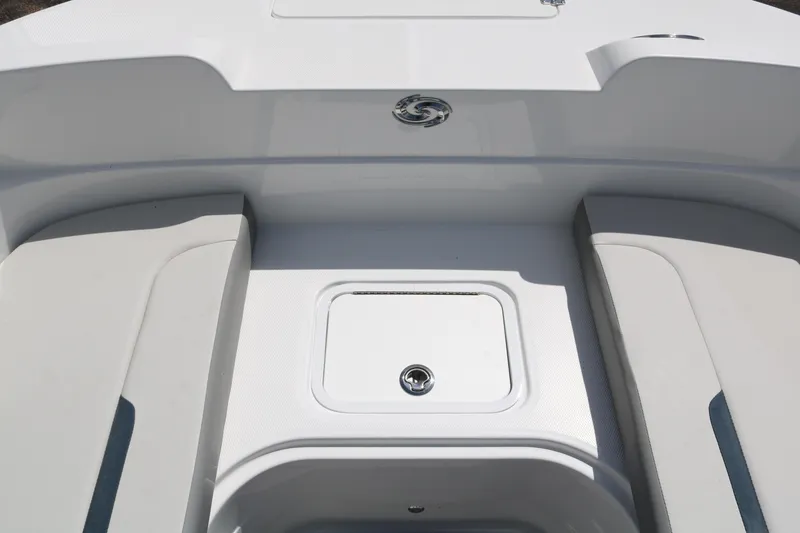 Slide: The Image of 2023 Hurricane SUN DECK 205 OB boat deck with storage compartment. - 17