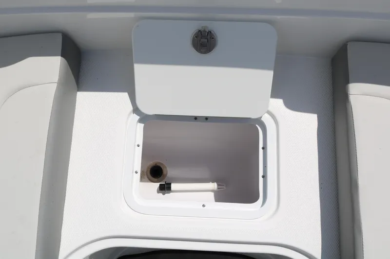 Slide: The Image of 2023 Hurricane SUN DECK 205 OB storage compartment with open hatch. - 18