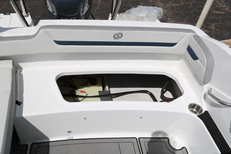 Slide: The Image of 2023 Hurricane SUN DECK 205 OB boat storage compartment and seating area. - 30