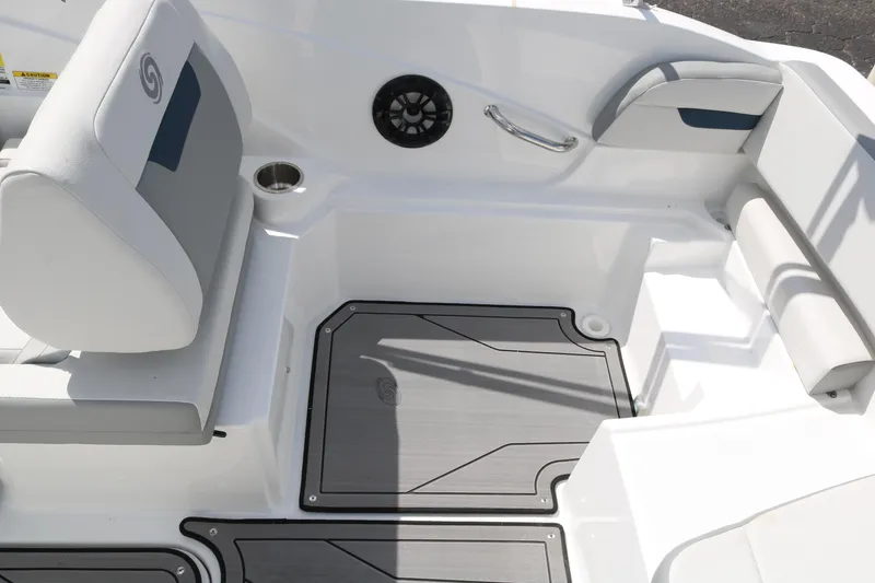 Slide: The Image of 2023 Hurricane SUN DECK 205 OB boat interior with seating and storage compartments. - 32