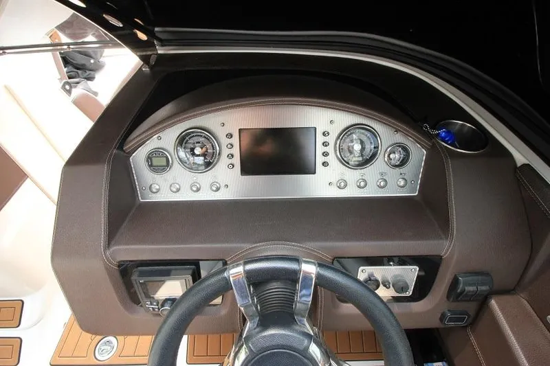 Slide: The Image of The image shows the dashboard of a 2016 Regal 2800 Bowrider with modern instruments. - 17