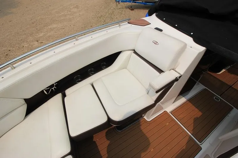 Slide: The Image of The image shows the cockpit of a 2016 Regal 2800 Bowrider with white upholstery. - 22