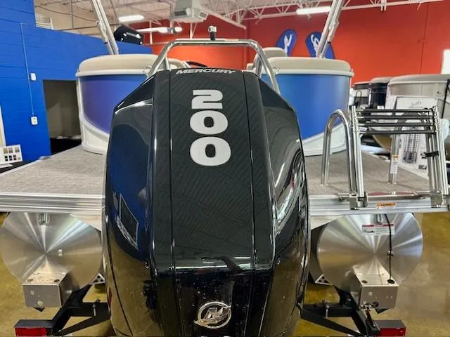 Slide: The Image of 2023 Barletta Cabrio 22QC pontoon boat with Mercury 200 outboard motor. - 2