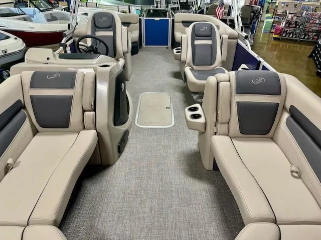 Slide: The Image of 2023 Barletta Cabrio 22QC pontoon boat interior with luxurious seating and modern design. - 4