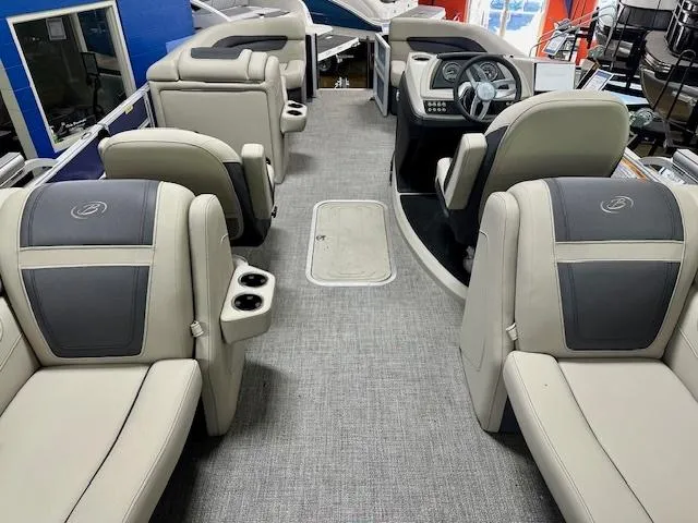 Slide: The Image of 2023 Barletta Cabrio 22QC interior with luxurious seating and modern dashboard. - 7