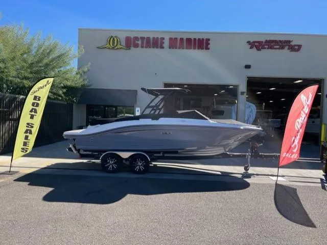 Slide: The Image of 2023 Sea Ray SPX 210 boat displayed at Octane Marine dealership. - 21