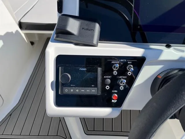 Slide: The Image of Control panel of 2023 Sea Ray SPX 210 boat with Fusion audio system. - 26