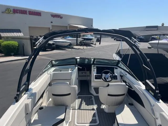 Slide: The Image of 2023 Sea Ray SPX 210 boat interior at Octane Marine dealership. - 47