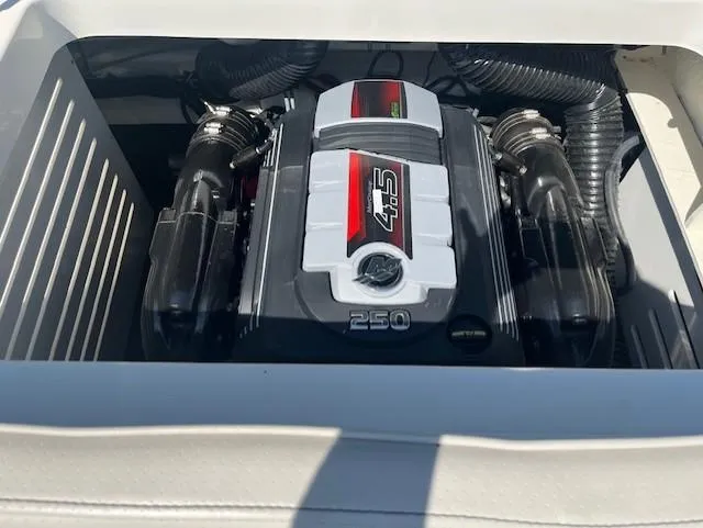 Slide: The Image of 2023 Sea Ray SPX 210 boat engine compartment with 250 HP engine. - 48