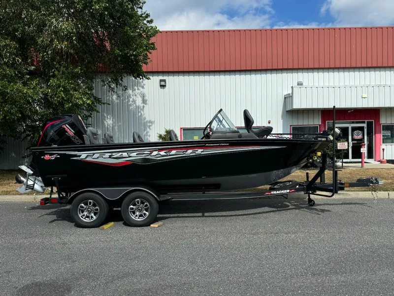 The Image of 2023 Tracker Targa V-19 WT boat on trailer, parked outdoors. - 0