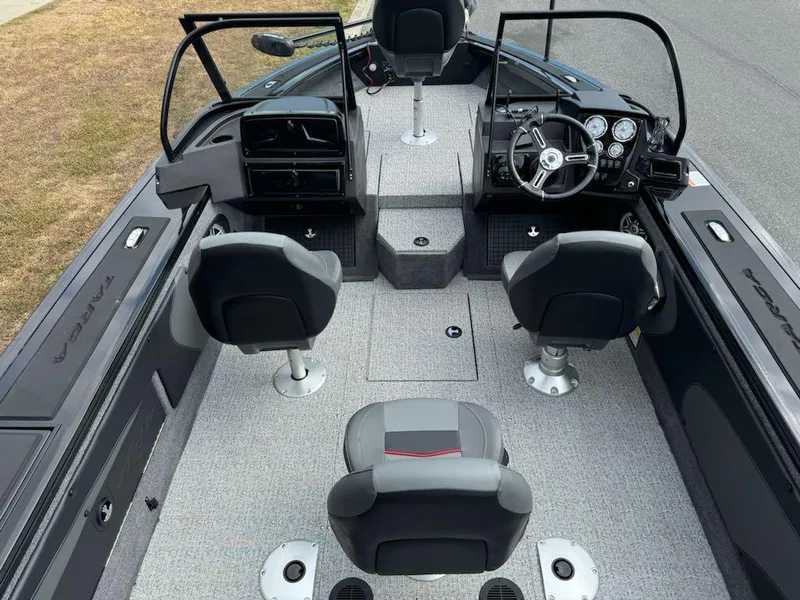 Slide: The Image of 2023 Tracker Targa V-19 WT boat interior with seating and steering console. - 6