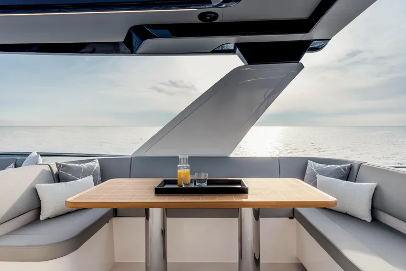 Slide: The Image of Luxurious interior of 2026 Absolute 58 Navetta yacht with modern design and ocean view. - 12