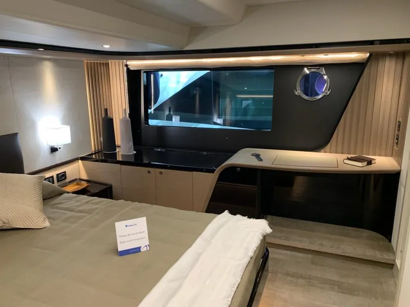 Slide: The Image of Luxurious bedroom interior of 2026 Absolute 58 Navetta yacht with scenic ocean views. - 22